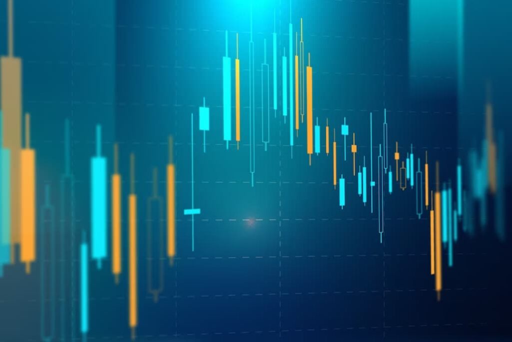 A blue-toned stock market graph with candlestick patterns displayed
